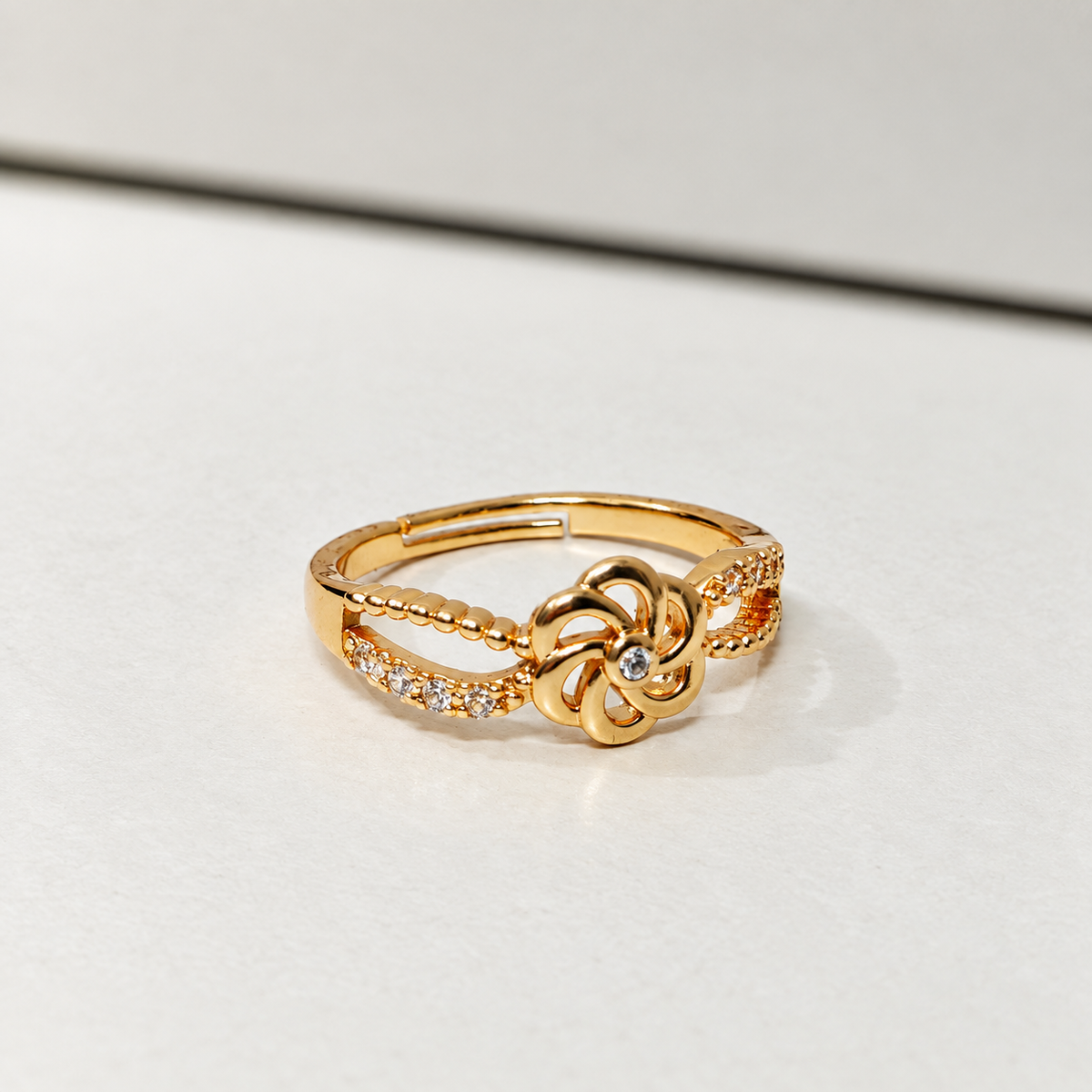Gulnaar Pinwheel Floral Rose Gold-Tone Ring — size and design details
