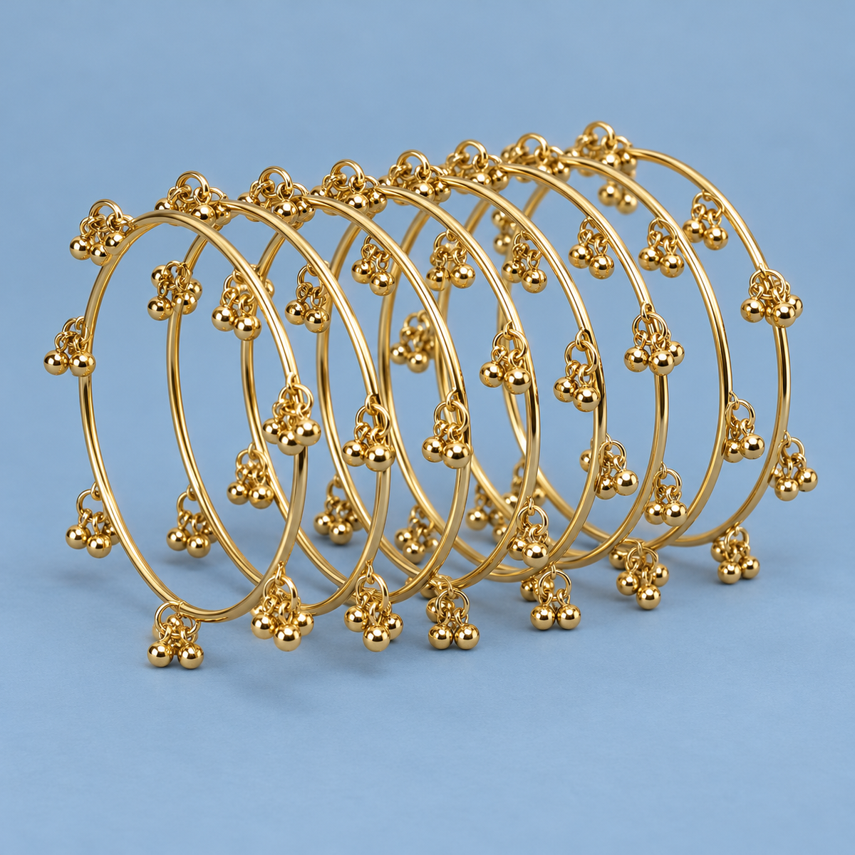 Jhankar Gold-Tone Ghungroo Bangles – Set of 8 | MyJhumki