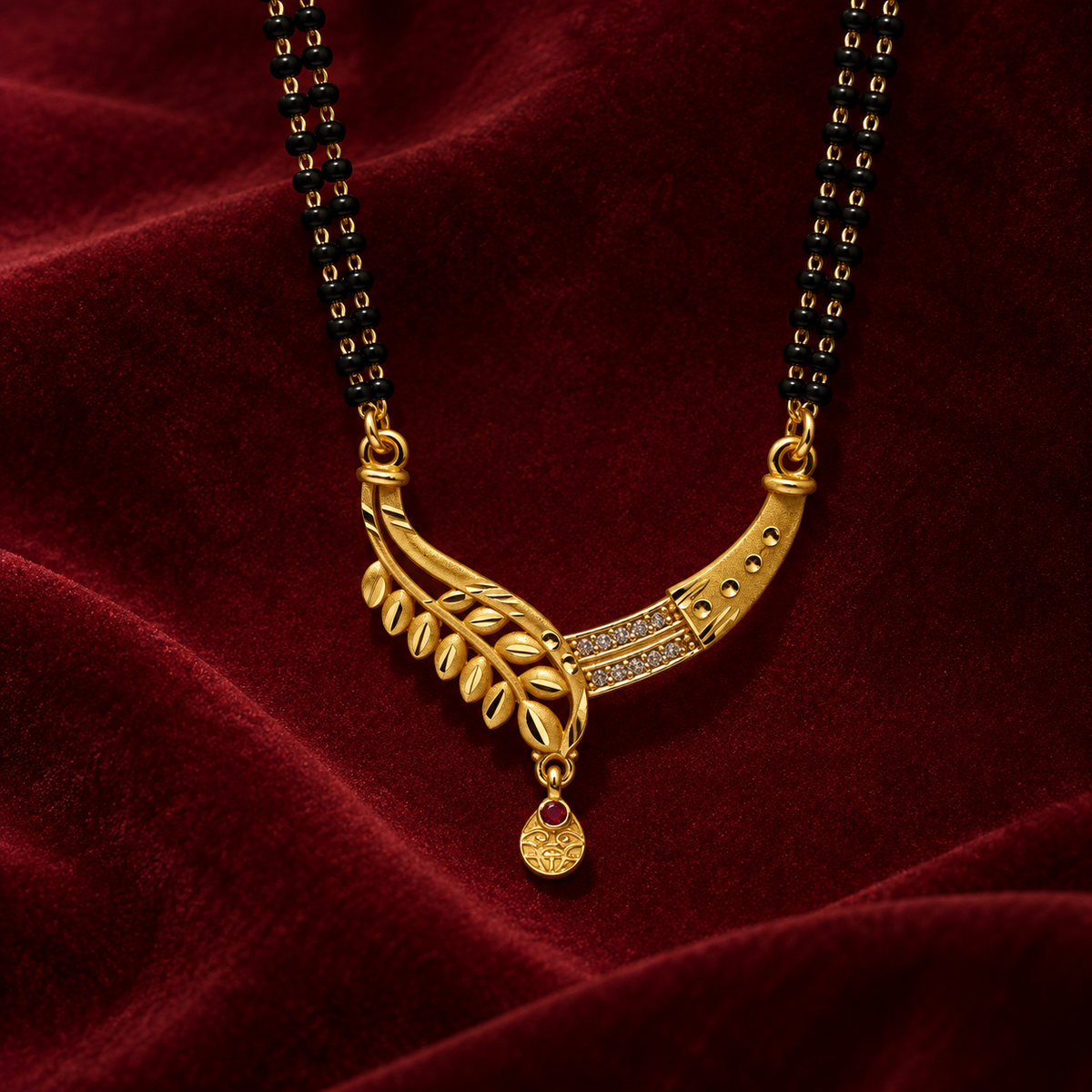 Aarohi Leaf Arc Mangalsutra on a burgundy velvet backdrop