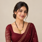 Model wearing the Aarohi Leaf Arc Mangalsutra with a wine outfit