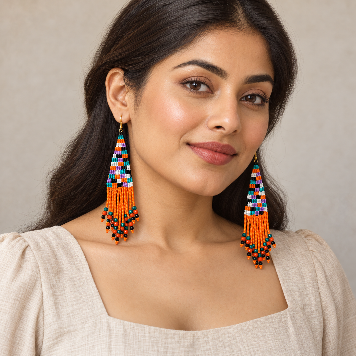 Aarohi Orange Beaded Tassel Earrings | MyJhumki