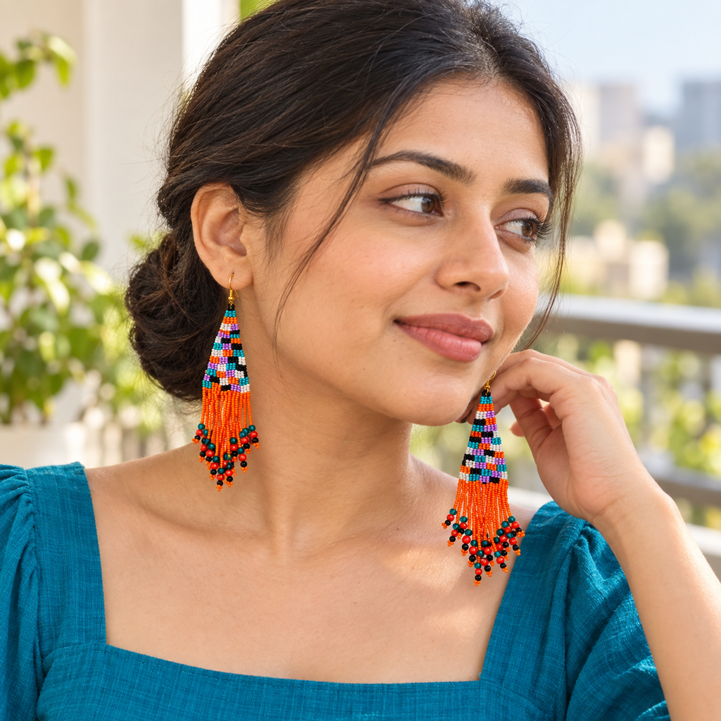 Aarohi Orange Beaded Tassel Earrings | MyJhumki