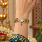 Model wearing the Gulabi Noor Floral Pearl Kashmiri Jewellery Watch with an emerald outfit