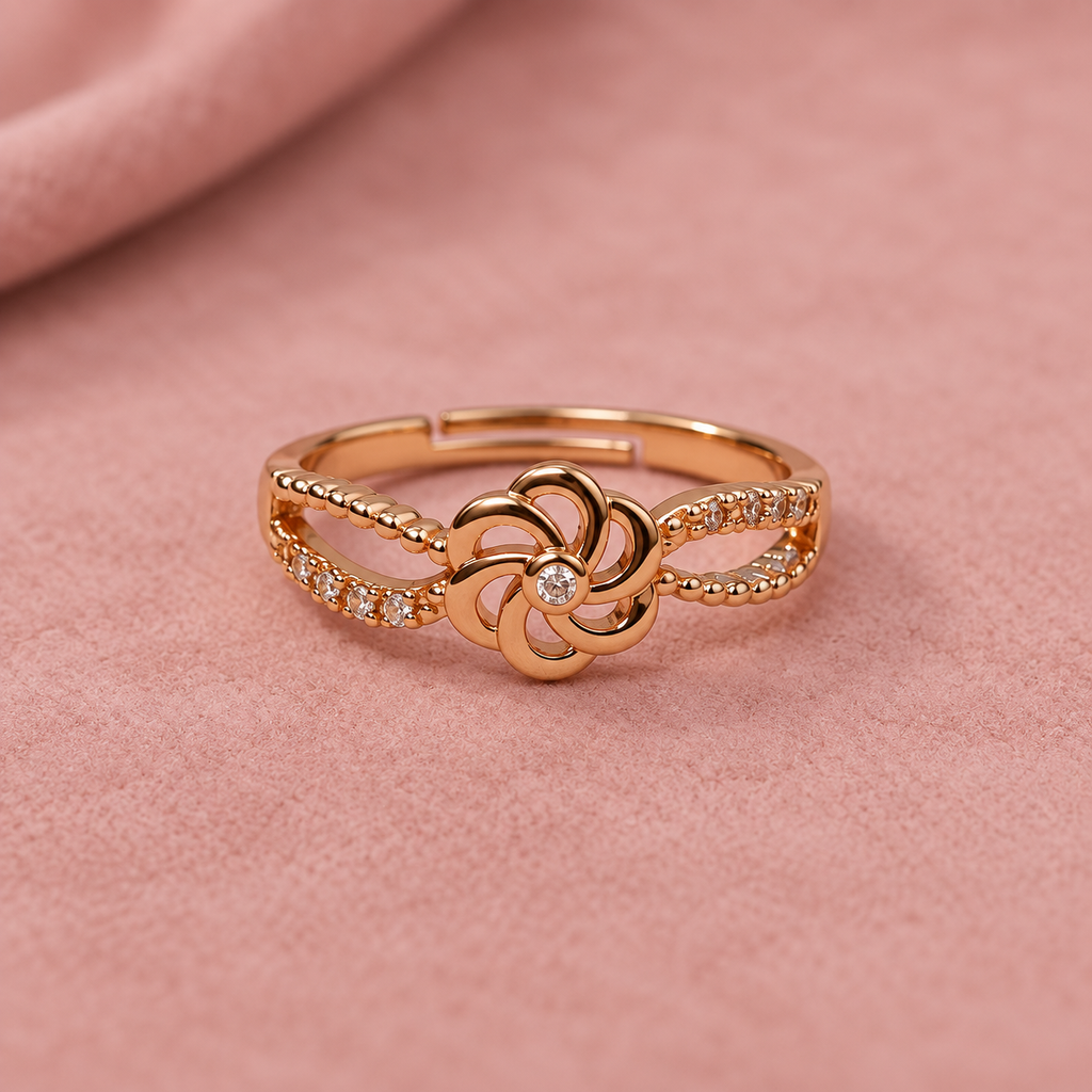 Gulnaar Pinwheel Floral Rose Gold-Tone Ring on a blush suede backdrop