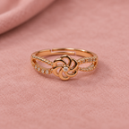 Gulnaar Pinwheel Floral Rose Gold-Tone Ring on a blush suede backdrop