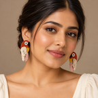 Gulnaar Rust Parrot Statement Earrings | MyJhumki