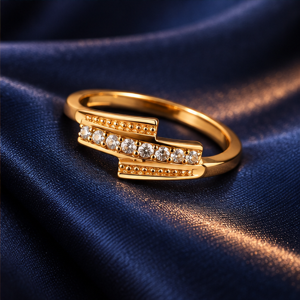 Meher Staggered Sparkle Gold-Tone Ring on an indigo satin backdrop