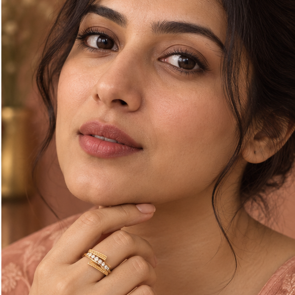 Model wearing the Meher Staggered Sparkle Gold-Tone Ring — close-up