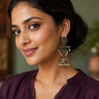 Model wearing the Neel Kamal Antique Lotus Jhumka Earrings — close-up