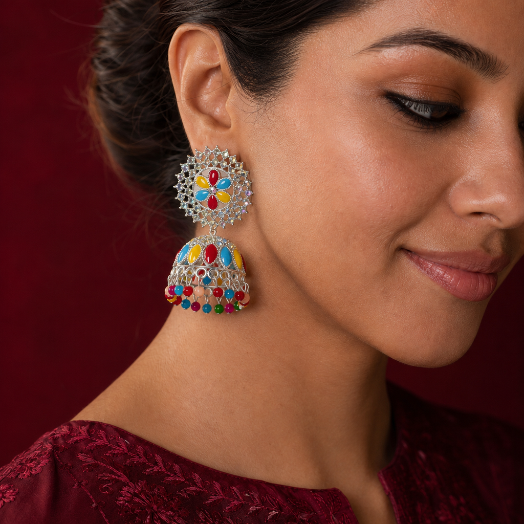 Model wearing the Rangoli Bloom Multicolour Jhumka Earrings – Silver-Tone Floral Design — close-up