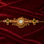 Rangrez Ruby Emerald Kashmiri Jewellery Watch on a wine velvet backdrop