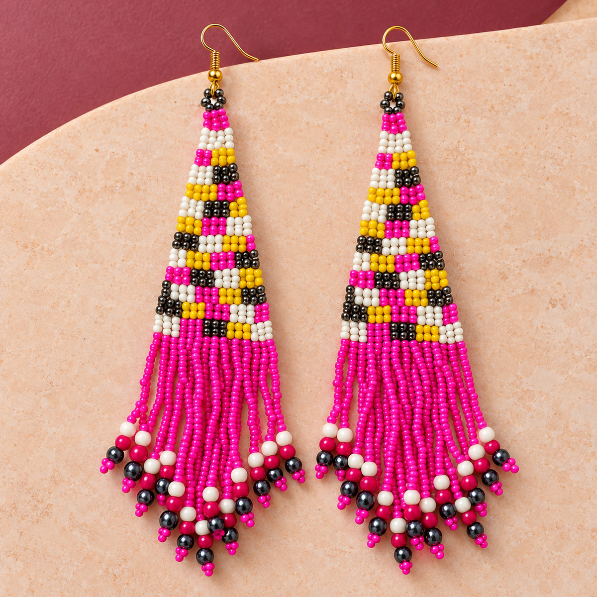 Rani Pink Striped Beaded Tassel Earrings | MyJhumki