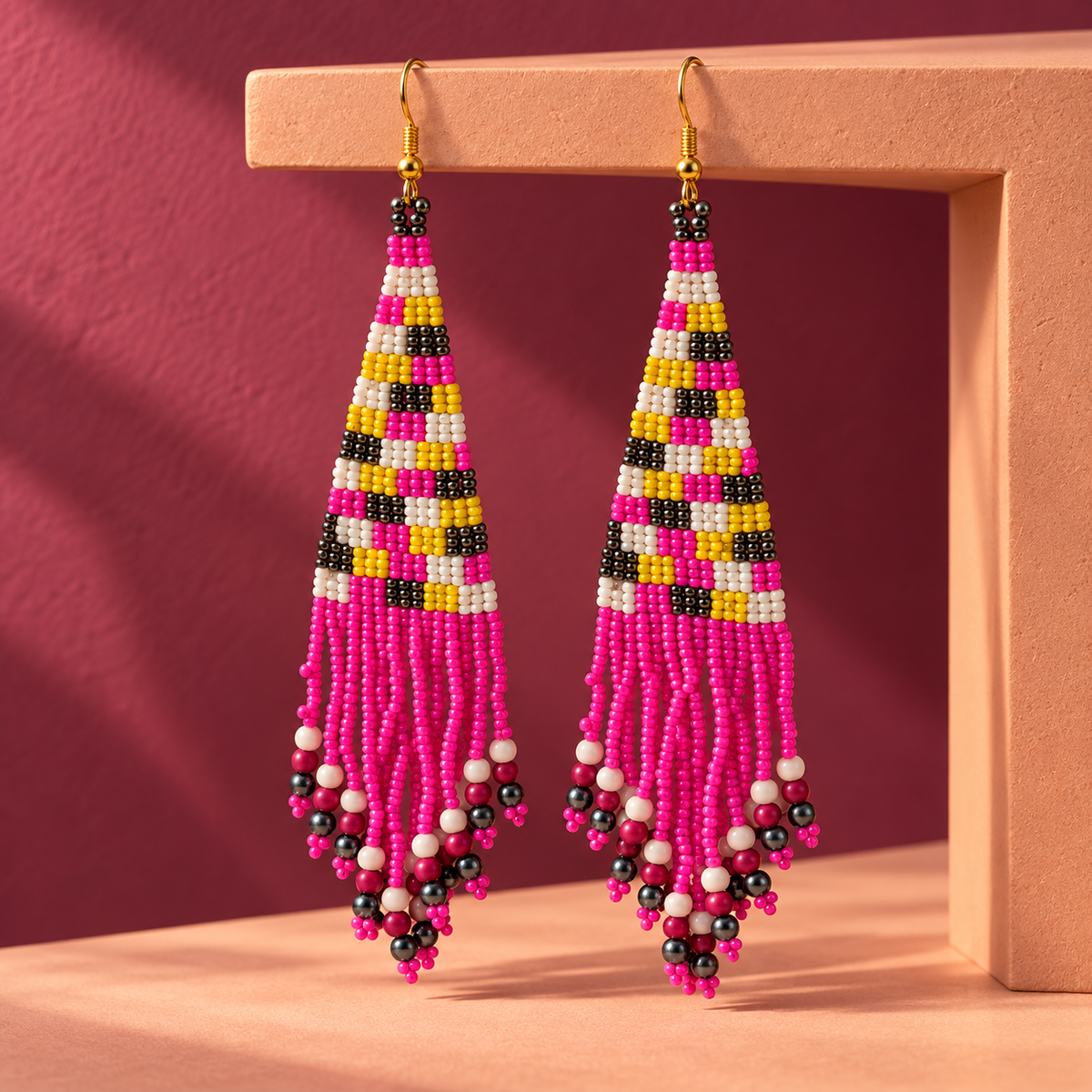 Rani Pink Striped Beaded Tassel Earrings | MyJhumki
