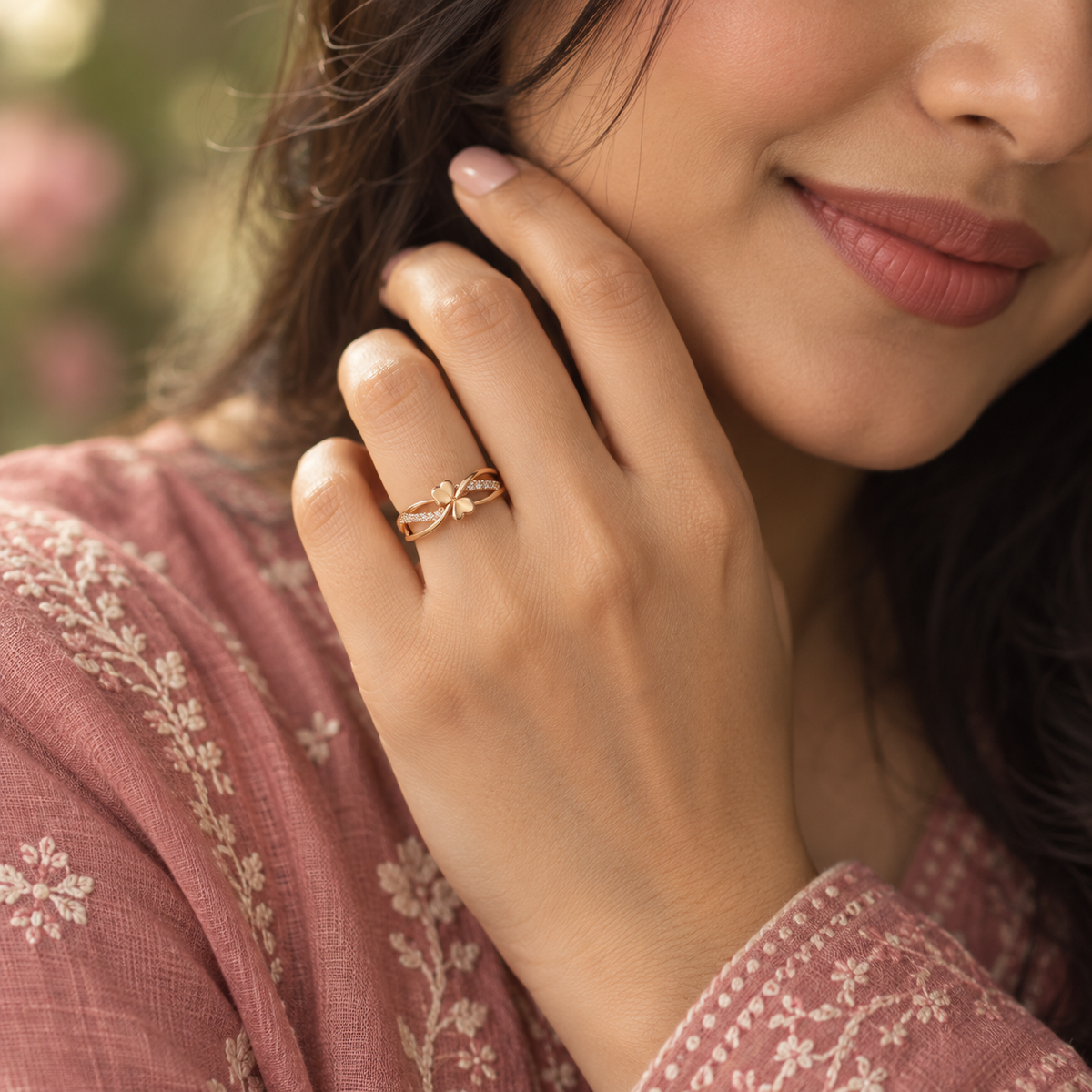 Model wearing the Tara Three-Leaf Clover Rose Gold-Tone Ring — close-up