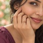 Model wearing the Titli Sparkle Butterfly Ribbon Rose Gold-Tone Ring — close-up